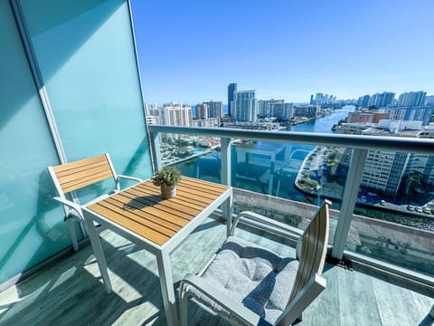 Charming private balcony with cozy seating — ideal for fresh air and morning views.