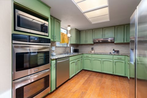 Our fully stocked kitchen features high-end appliances, ample cabinetry, and all the tools you need to create culinary masterpieces or whip up a quick meal. Cooking here is a breeze!