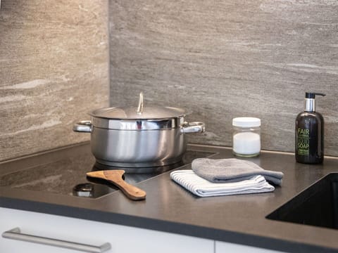 Flooring, Tableware, Countertop, Kitchen, Serveware, Tile, Tap