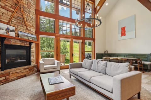 Main Living Space - Gas Fireplace, TV, Deck Access and Slope Views