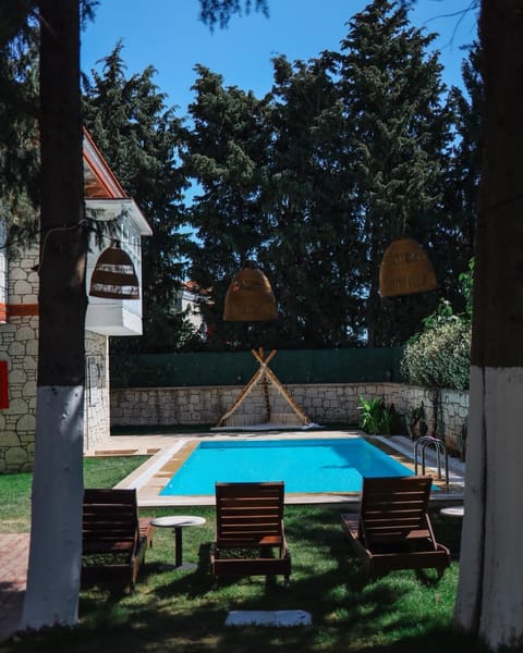 Seasonal outdoor pool, open 11:30 AM to 10:00 PM, lifeguards on site