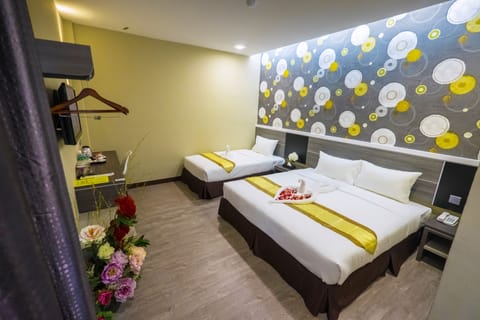 Family Triple Room, 1 Bedroom | In-room safe, desk, iron/ironing board, free WiFi