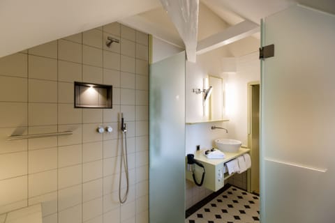 Suite, 1 Bedroom | Bathroom | Shower, free toiletries, hair dryer, bathrobes