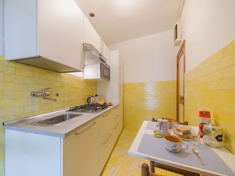 Flooring, Wood, Countertop, Kitchen, Interior Design, Floor, Major Appliance, Kitchen Appliance, Room, Tile