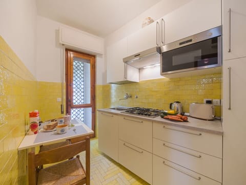 Kitchen, Kitchen Appliance, Countertop, Flooring, Interior Design, Major Appliance, Wood, Floor, Cabinetry, Room