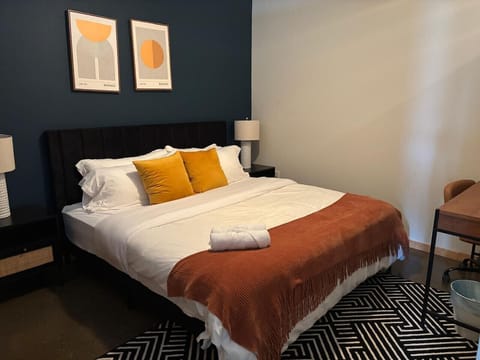As you lie back on the queen bed, you are surrounded by elegant decor and a soothing color palette that calms the senses.