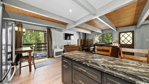 Kitchen opens to living