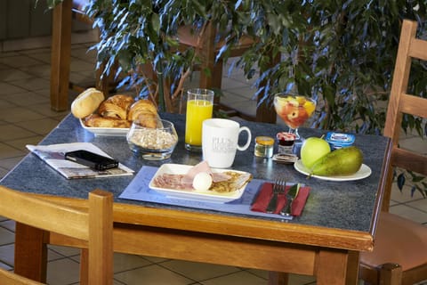 Daily buffet breakfast (EUR 12 per person)