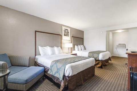 Room, 2 Queen Beds, Non Smoking | Desk, laptop workspace, blackout drapes, iron/ironing board