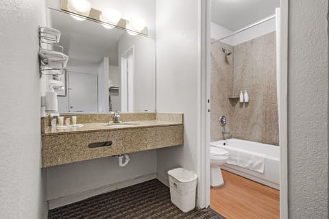 Room, 2 Queen Beds, Non Smoking | Bathroom | Combined shower/tub, free toiletries, hair dryer, towels