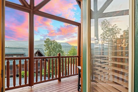 Enjoy mountain views from the wraparound deck