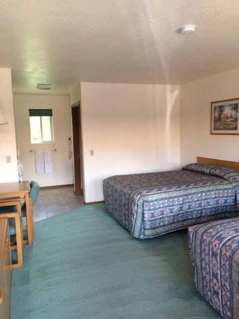 Classic Room, 2 Queen Beds, Non Smoking, Mountain View | Blackout drapes, iron/ironing board, free cribs/infant beds
