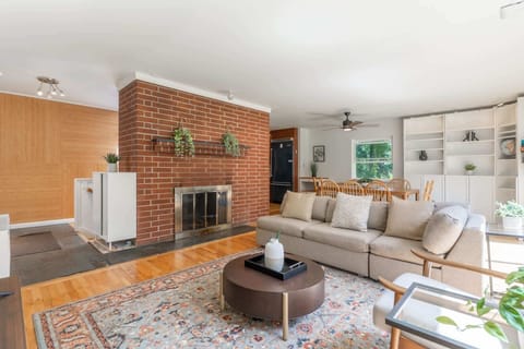The living room opens seamlessly to the calm of the backyard.