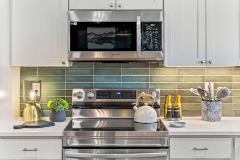 Kitchen is ready with oils and spices for you.