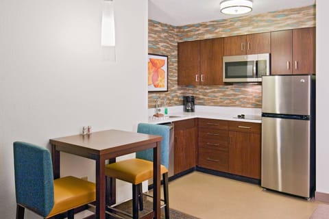 Suite, 1 Double Bed | Private kitchenette | Full-size fridge, microwave, stovetop, dishwasher