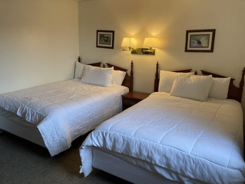 Room, 2 Double Beds | Pillowtop beds, desk, iron/ironing board, free WiFi