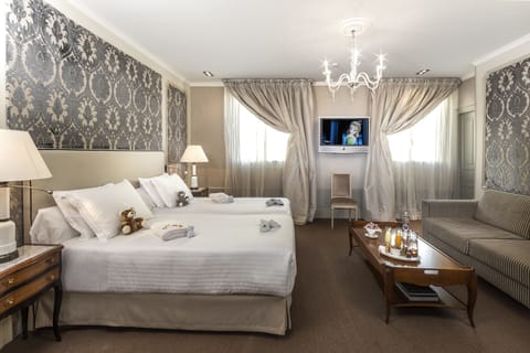 Family Room | Egyptian cotton sheets, premium bedding, down comforters, minibar