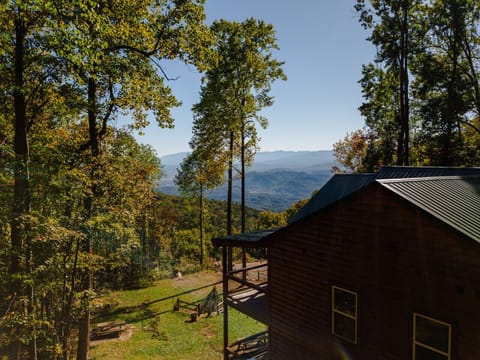 In this resort, experience Smoky Mountain serenity from your private cabin with panoramic views at every turn.