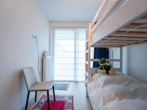 Furniture, Interior Design, Floor, Flooring, Bedroom, Wood, Bed, Bed Sheet, Room, Lighting