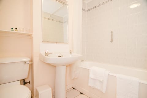 Combined shower/tub, hair dryer, towels, soap