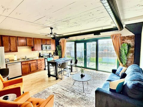 Private Patio Escape
Unwind on your own outdoor terrace complete with seating and a partial lake view—just steps from the living room.

