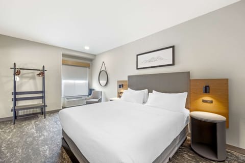 Suite, Multiple Beds, Non Smoking | In-room safe, desk, laptop workspace, iron/ironing board
