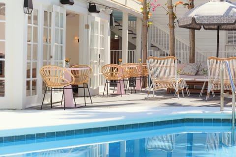 Outdoor pool, open 8:00 AM to 10:00 PM, sun loungers