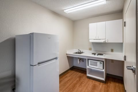 Studio, 1 Queen Bed, Accessible, Non Smoking | Private kitchen | Full-size fridge, microwave, stovetop