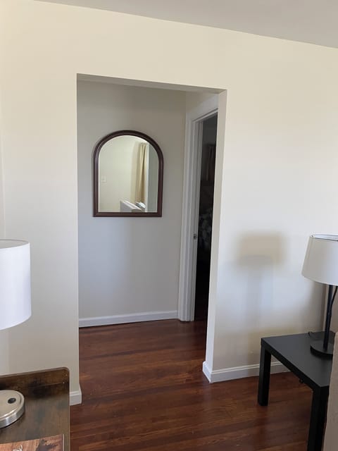 Entryway to kitchen to the right, bedroom 2 to the left 