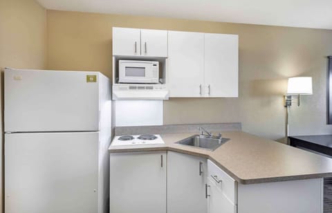 Studio, 1 King Bed, Non Smoking | Private kitchen | Full-size fridge, microwave, stovetop, coffee/tea maker