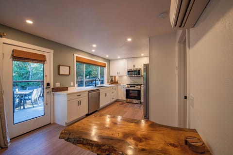 House, Multiple Beds, Patio, Garden View (Downtown Treehouse) | Private kitchen | Coffee/tea maker