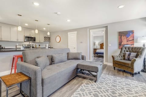 Spacious open layout with a pull-out sofa and a modern kitchen just steps away for easy lounging and dining








