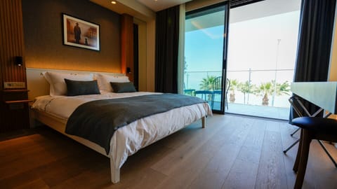 Deluxe Double Room, Balcony, Sea View | Premium bedding, minibar, in-room safe, individually decorated