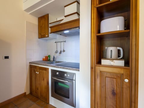 Kitchen, Wood, Cabinetry, Countertop, Major Appliance, Flooring, Kitchen Appliance, Interior Design, Furniture, Room