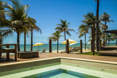 On the beach, sun loungers, beach umbrellas, beach towels