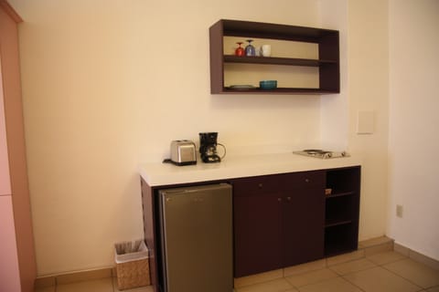 Studio | Private kitchenette | Full-size fridge, microwave, stovetop, coffee/tea maker