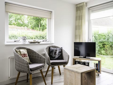 Furniture, Interior Design, Flooring, Wood, Floor, Home, Lighting, Chair, Room, Living Room