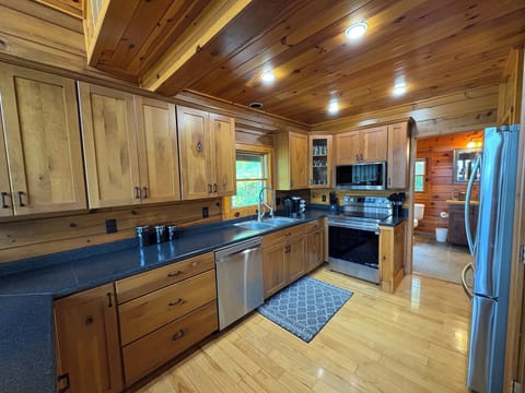 Kitchen featuring Brand new stainless steel appliances 