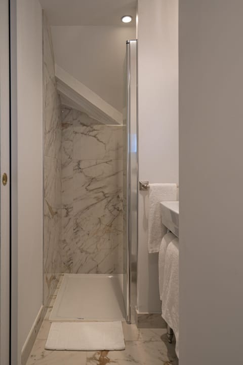 Comfort Room | Bathroom | Shower, hair dryer, towels, soap