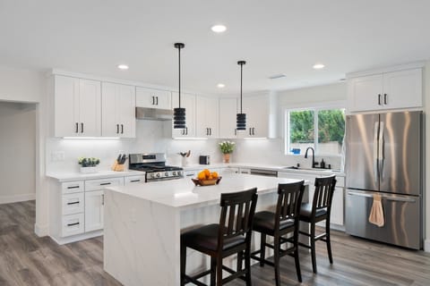 Spacious island seating lets you cook, dine, and unwind all in one place.