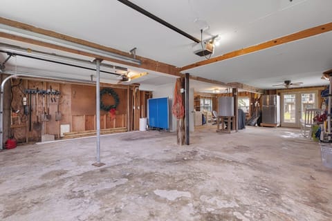 parking available on the left - no tall trucks due to garage door mechanism. Ping pong table on the right not showing. Pictures to come!