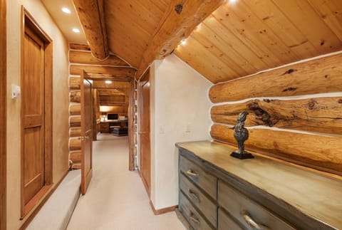 Down the hall is the Primary suite bathroom with ample storage for clothing and gear and features a separate toilet.