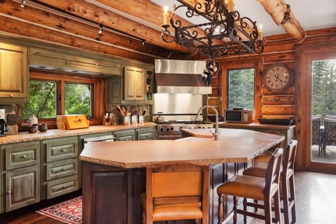 Modern Kitchen with a log cabin vibe.