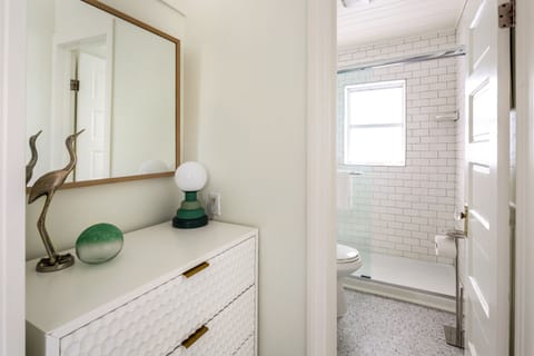 The Coral Lee (1 Bedroom/1 Bath) | Bathroom | Shower, designer toiletries, hair dryer, towels