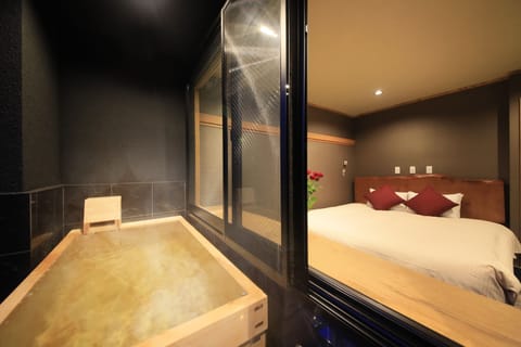 Standard King Room with Open Air Bath, Panorama View | Bathroom | Free toiletries, hair dryer, slippers, bidet