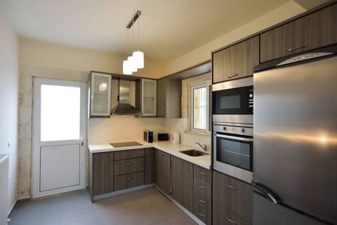 A fully equipped kitchen space where culinary creativity meets convenience.
