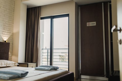 Family Quadruple Room, Balcony, Courtyard View | Soundproofing, free WiFi