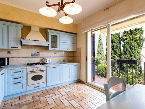 Kitchen, Interior Design, Flooring, Major Appliance, Wood, Countertop, Kitchen Appliance, Furniture, Floor, Cabinetry