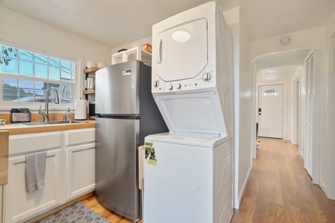 Washer and dryer located right in the kitchenette space for your convenience.