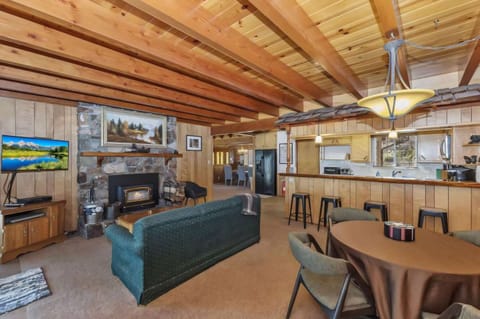 Cozy up by the fireplace. (Classic Lake House)